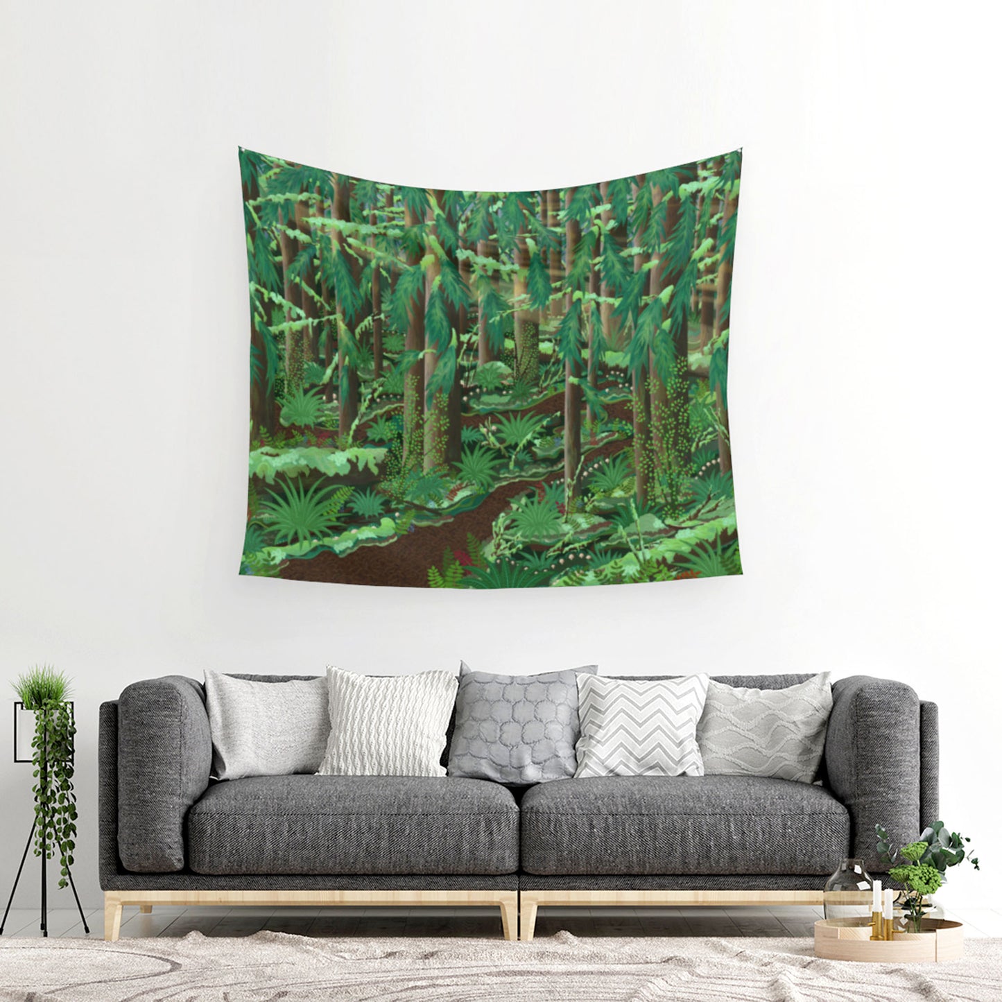 mockup for tapestry on wall with digital design showing a trail in the forest amongst the many trees and their branches branching out as the sun selectively slips through as certain sunbeams above all the mushrooms, ferns, firs and moss hanging on the wall above five belows resting on a pillow couch